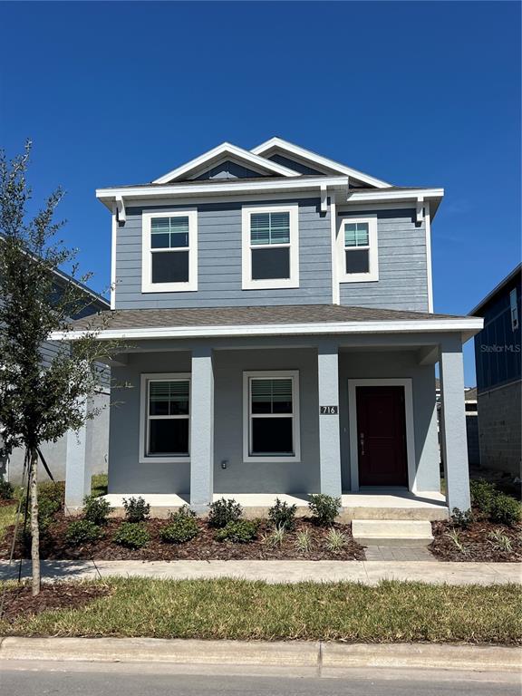 a front view of a house with yard