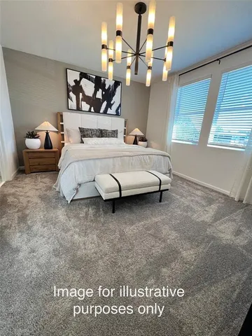 a bedroom with bed and window