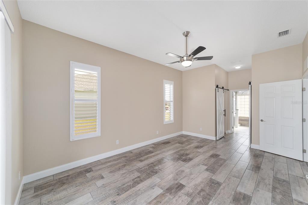 5565 Northwest 26th Lane Ocala, FL 34482 - Photo 23 of 59 a view of an empty room with a window
