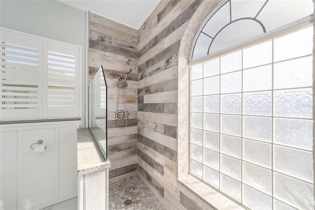 5565 Northwest 26th Lane Ocala, FL 34482 - Photo 26 of 59 a view of walk in closet with empty racks