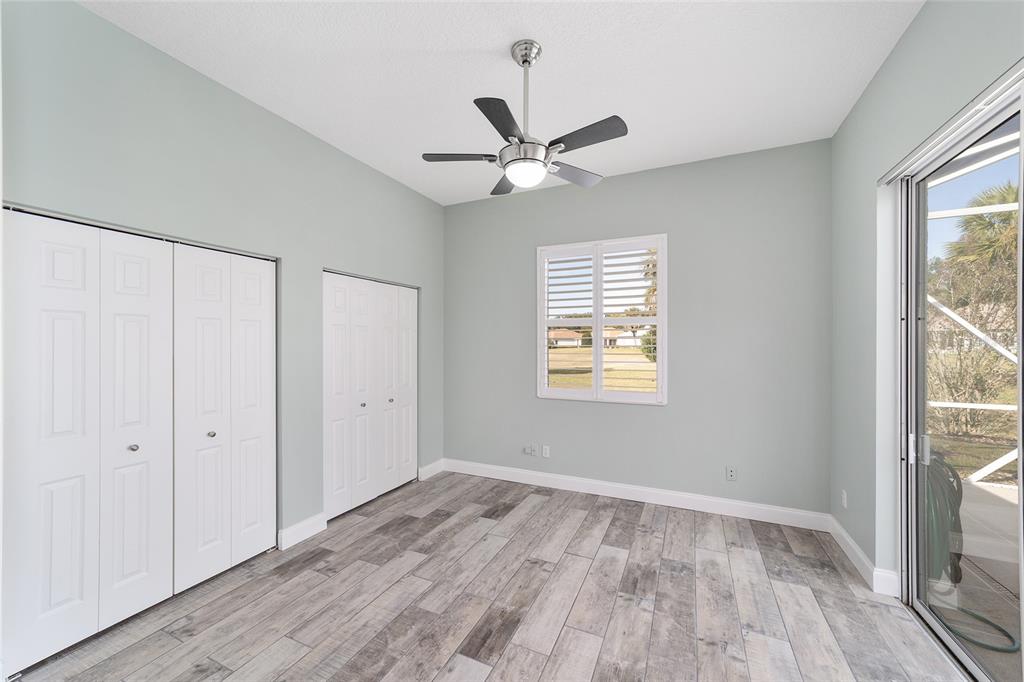 5565 Northwest 26th Lane Ocala, FL 34482 - Photo 32 of 59 wooden floor in an empty room with a window