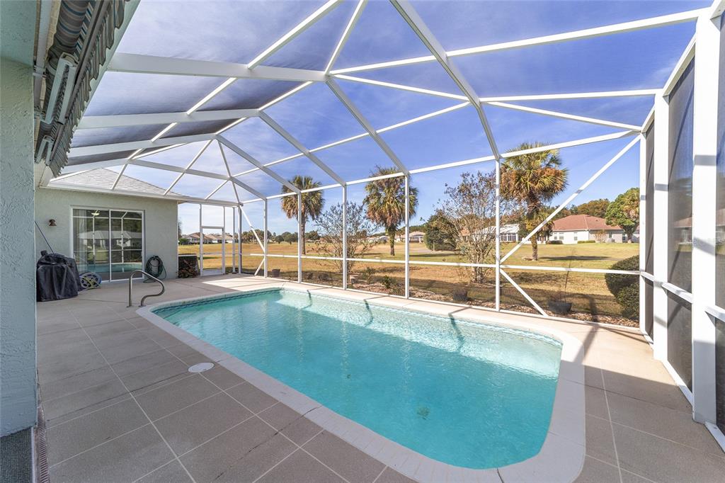 5565 Northwest 26th Lane Ocala, FL 34482 - Photo 39 of 59 a view of a swimming pool with a patio