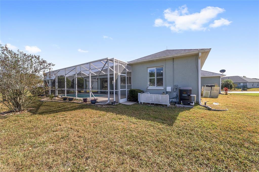 5565 Northwest 26th Lane Ocala, FL 34482 - Photo 44 of 59 a view of a house with backyard and sitting area