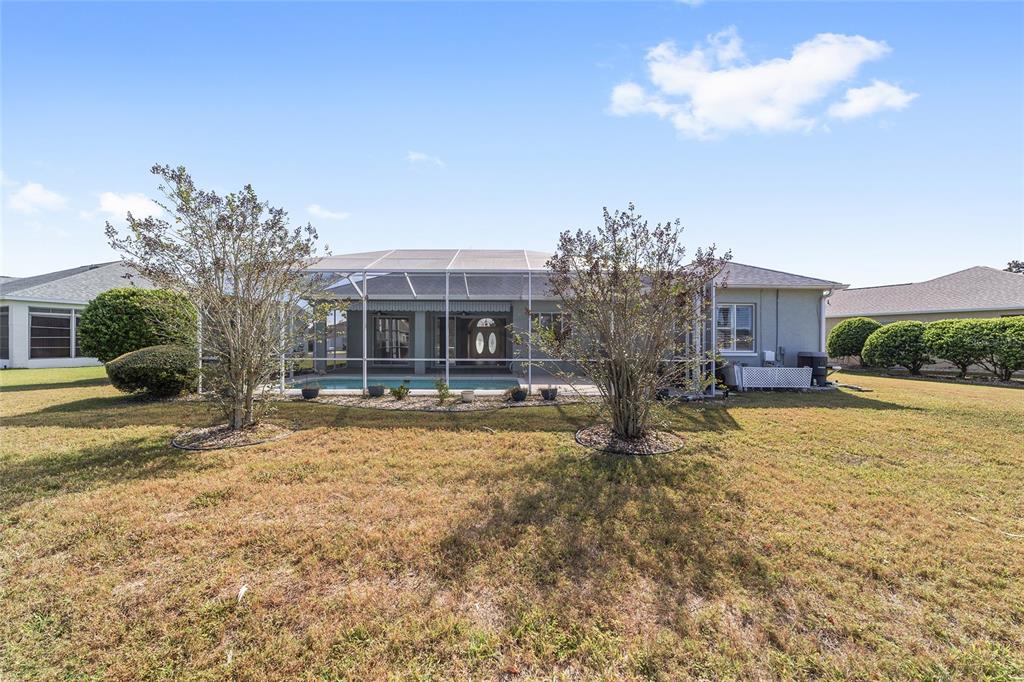 5565 Northwest 26th Lane Ocala, FL 34482 - Photo 45 of 59 a house with trees in front of it