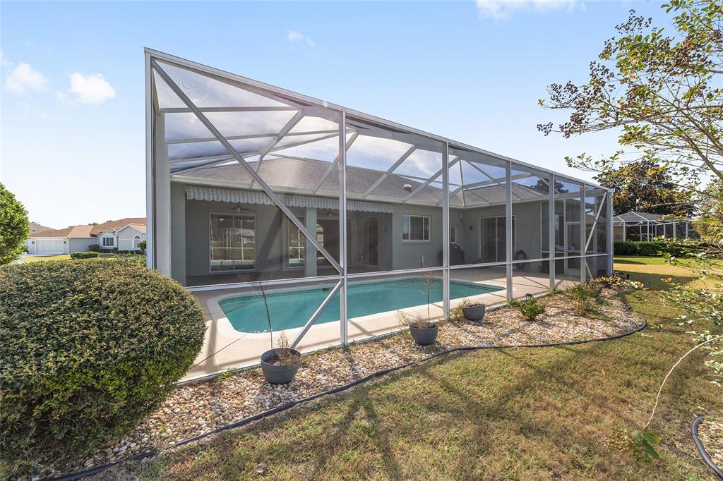 5565 Northwest 26th Lane Ocala, FL 34482 - Photo 46 of 59 a house with trees in the background