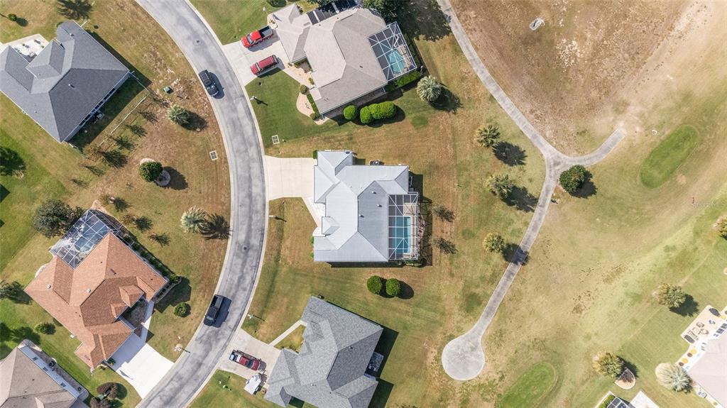 5565 Northwest 26th Lane Ocala, FL 34482 - Photo 58 of 59 an aerial view of residential house with outdoor space and parking