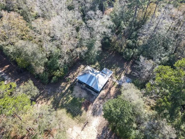an aerial view of residential house with outdoor space
