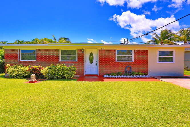 3864 Dunes Road Palm Beach Gardens, FL 33410 - Photo 1 of 44 Front of Home