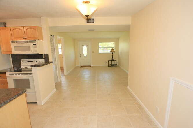 3864 Dunes Road Palm Beach Gardens, FL 33410 - Photo 12 of 44 Dining Room Living Room-666x444-72dpi