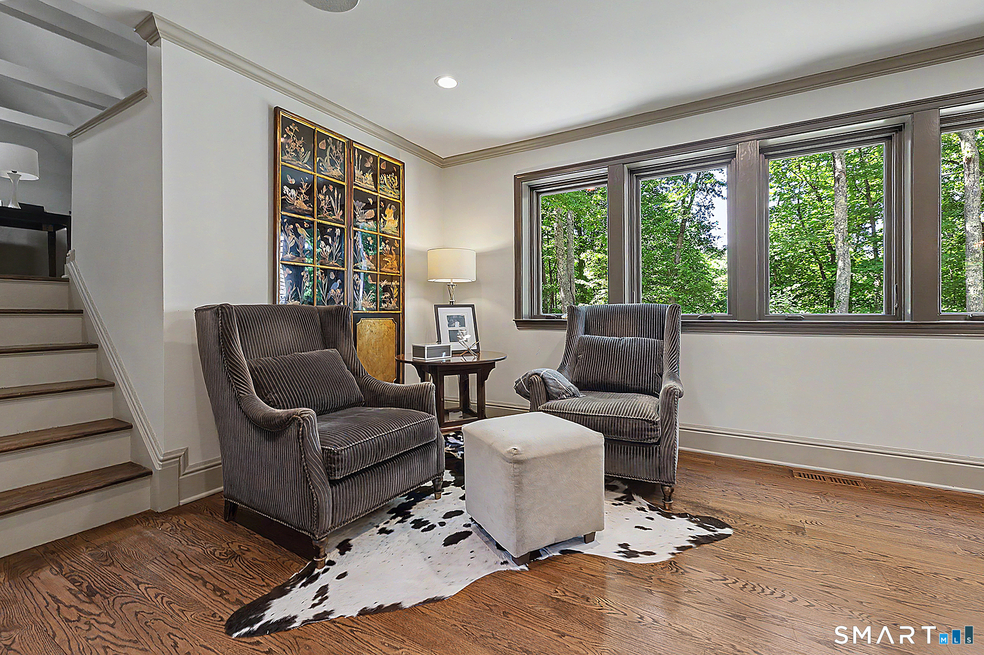 33 Hunter Lane Ridgefield, CT 06877 - Photo 10 of 39 a living room with furniture and a window