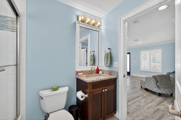 a view of living room with furniture and floor to ceiling window