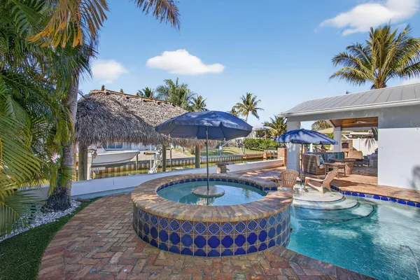 a view of a house with swimming pool