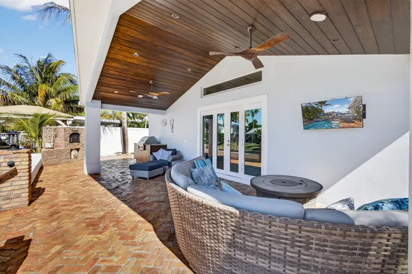 a view of a swimming pool with chairs
