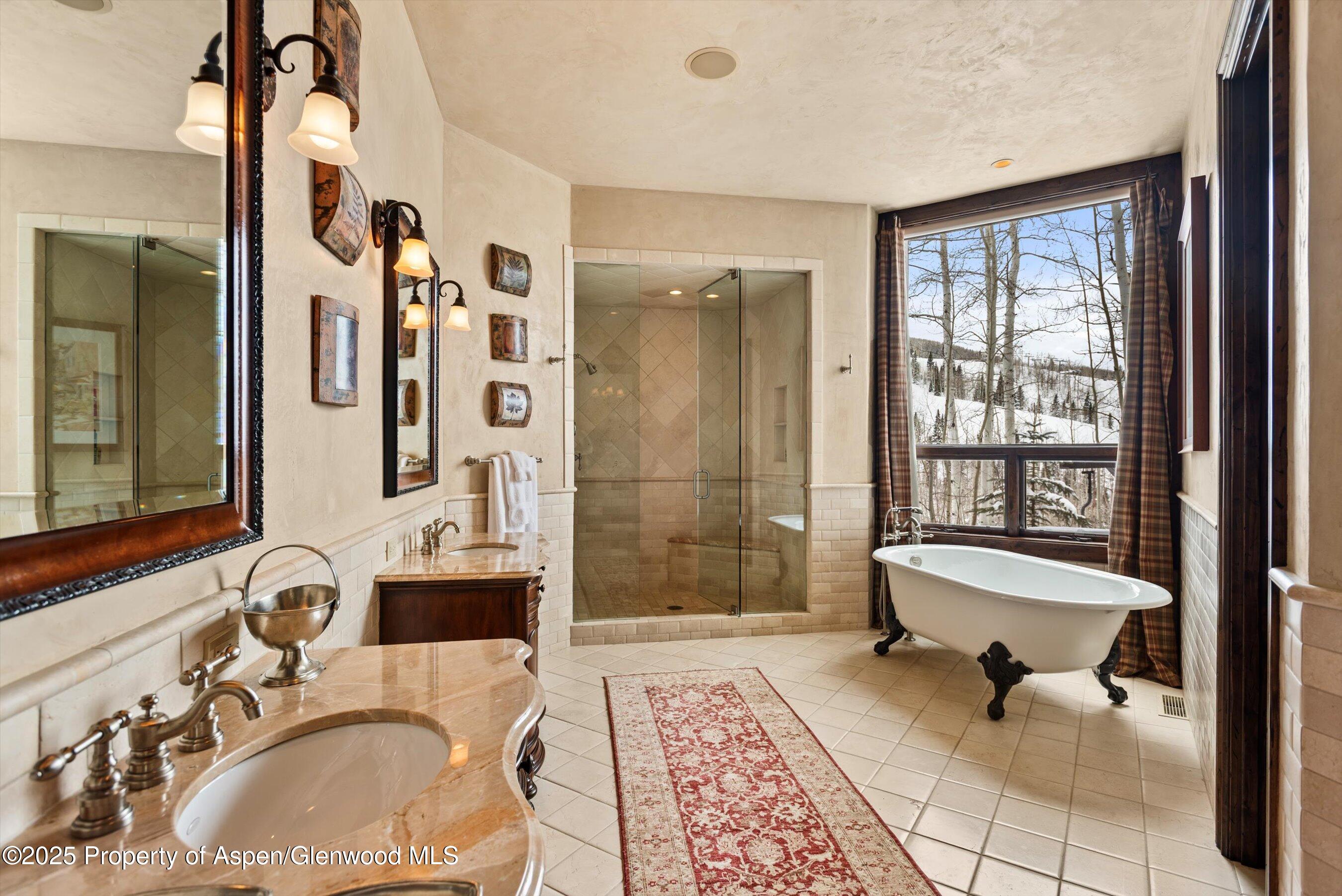 1777 Wood Road Snowmass Village, CO 81615 - Photo 13 of 27 a bathroom with a sink toilet and shower
