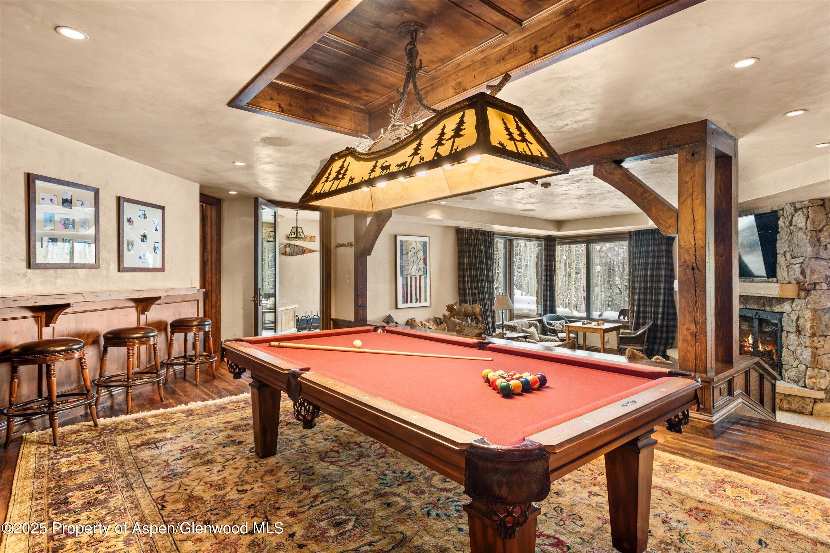 1777 Wood Road Snowmass Village, CO 81615 - Photo 20 of 27 a room with furniture pool table and windows