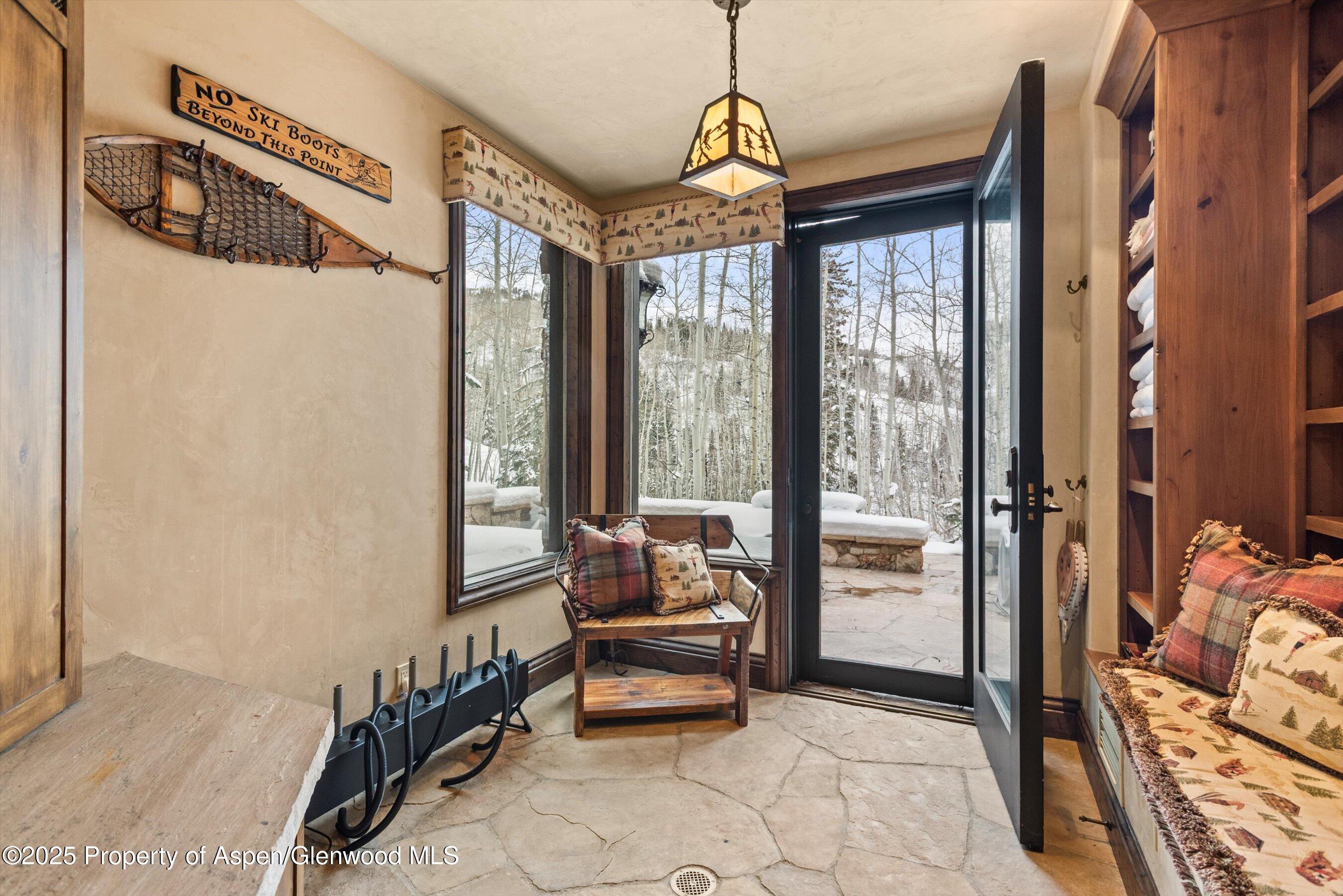 1777 Wood Road Snowmass Village, CO 81615 - Photo 21 of 27 a bedroom with furniture and a window