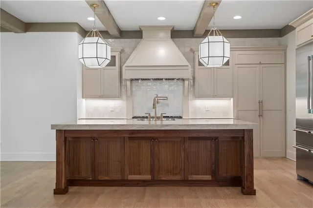 a room with wooden cabinets and entryway
