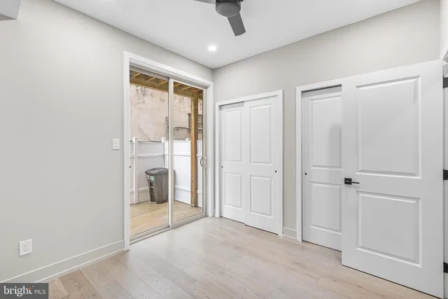 a view of entryway with wooden floor