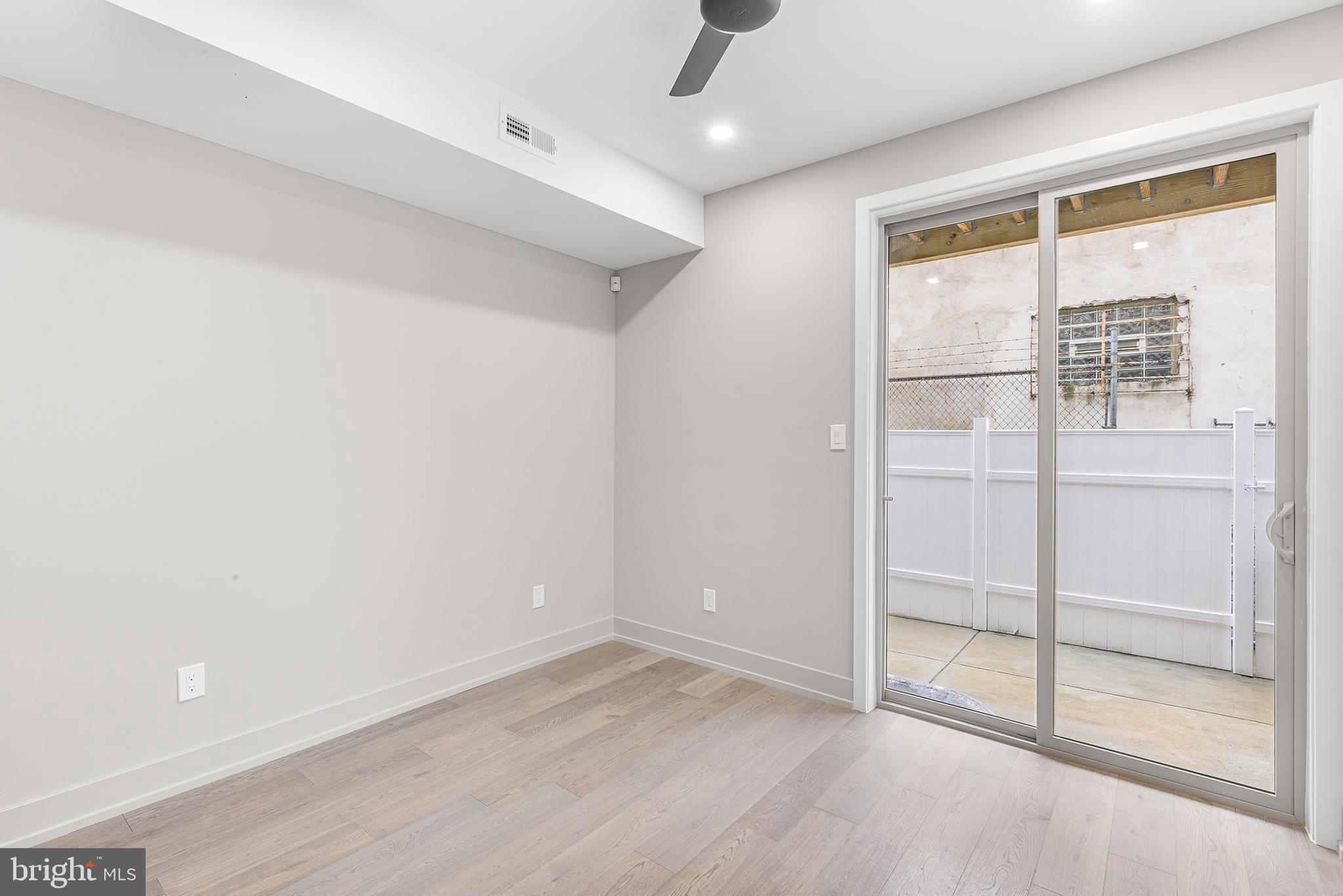 2340 Alter Street Philadelphia, PA 19146 - Photo 14 of 46 an empty room with windows