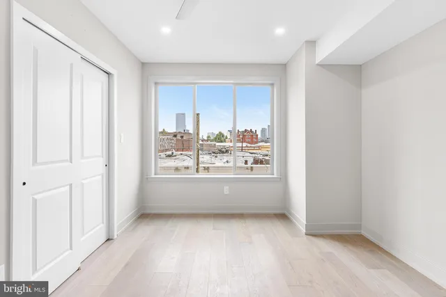 a view of an empty room and window