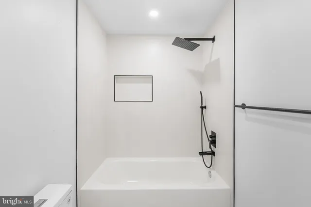 a bathroom with a bathtub