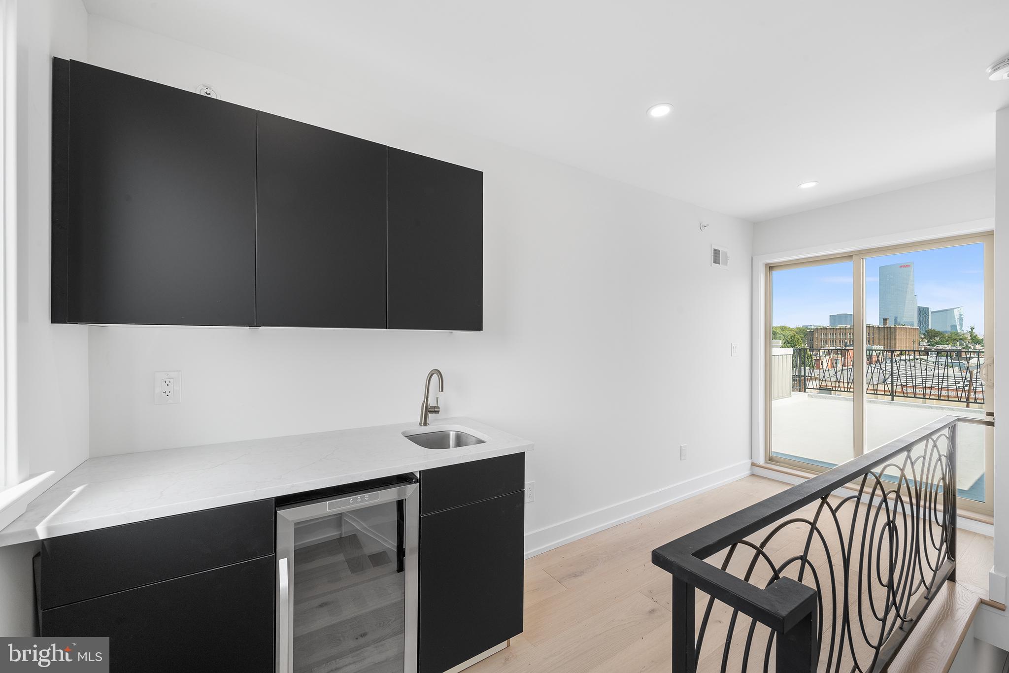 2340 Alter Street Philadelphia, PA 19146 - Photo 31 of 46 a bathroom with a sink and a mirror