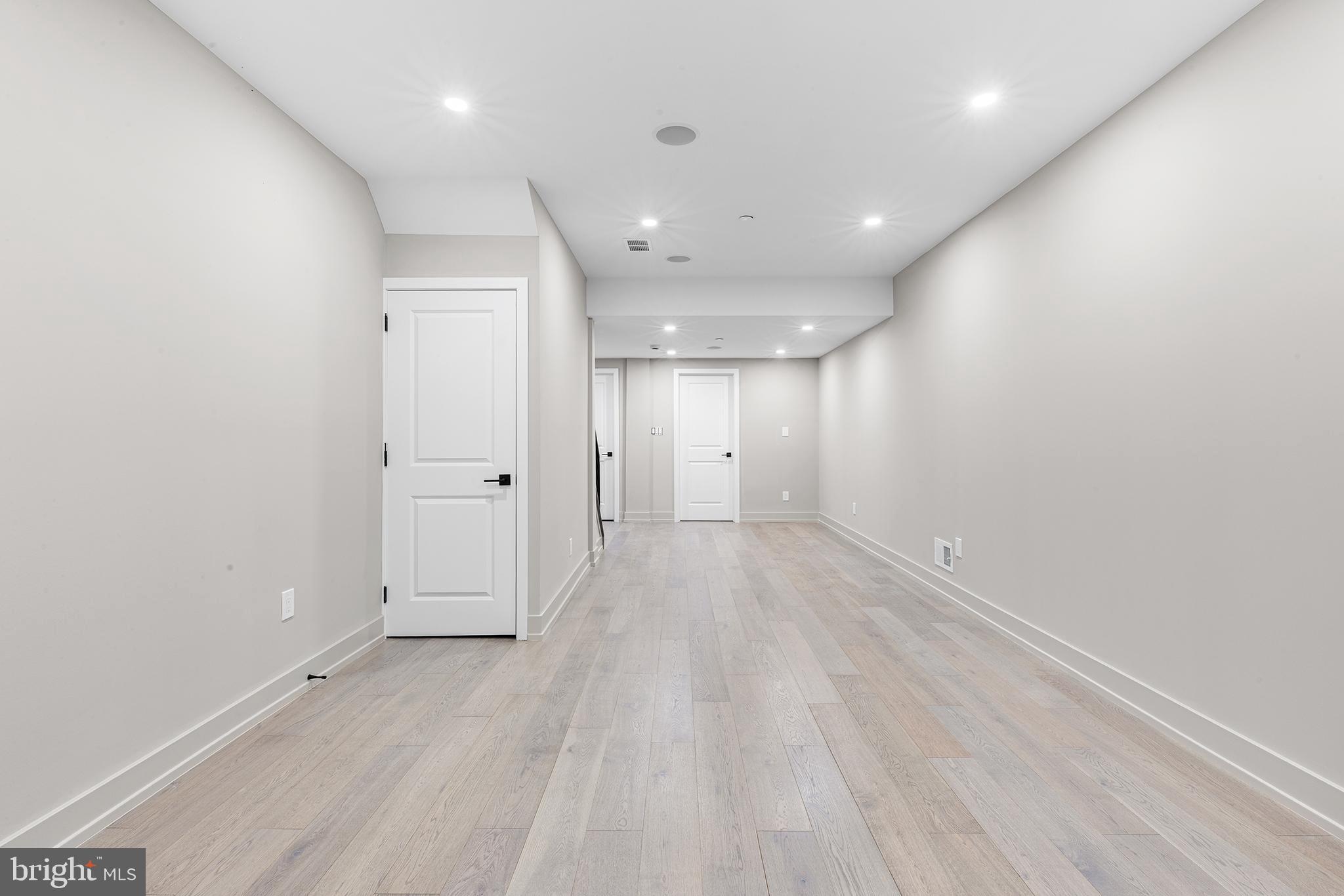 2340 Alter Street Philadelphia, PA 19146 - Photo 37 of 46 an empty room with wooden floor and windows