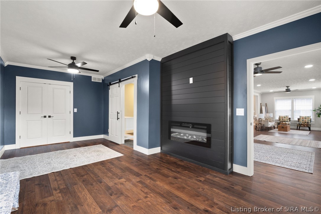 104 Cook Street Corydon, IN 47112 - Photo 7 of 50 Main bedroom on first level with built-in electric fireplace!