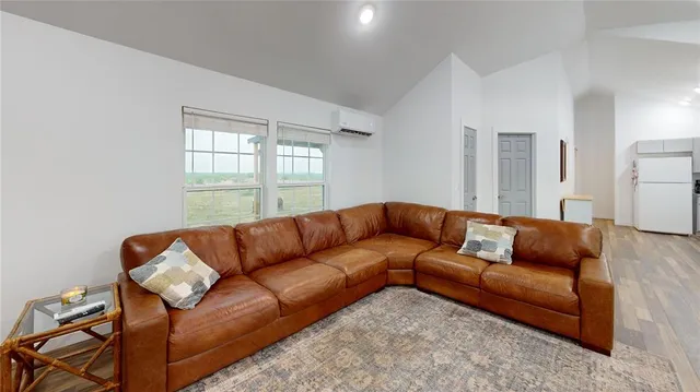 a living room with furniture and a couch