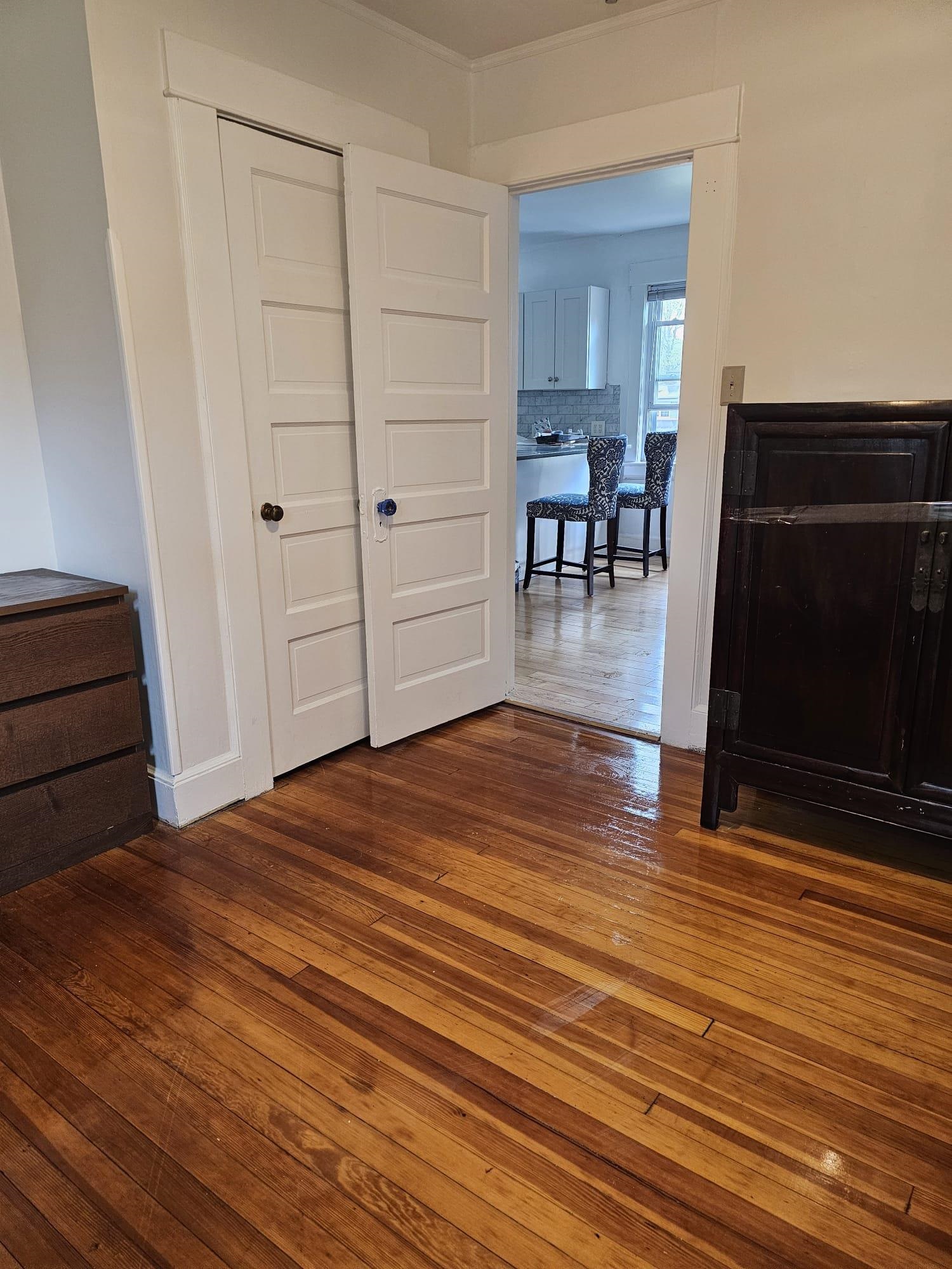 482 Sterling Place, Unit 2 Ridgewood, NJ 07450 - Photo 8 of 15 a view of empty room with wooden floor
