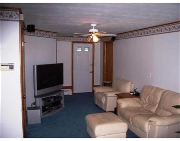 2001 Overlook Drive Three Rivers, MA 01080 - Photo 9 of 25 a living room with furniture and a flat screen tv