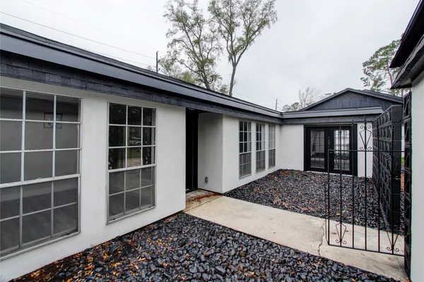 a view of front door and a window