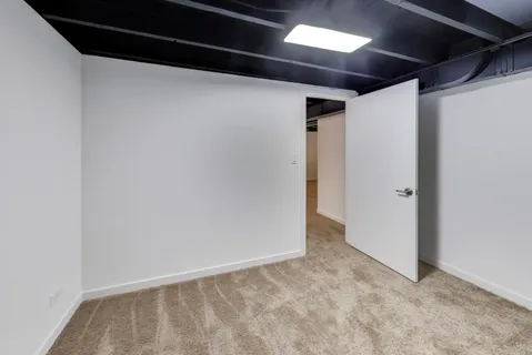 a bathroom with a sink toilet and vanity