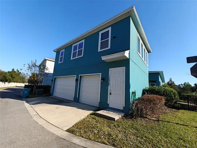 a house view with a backyard space