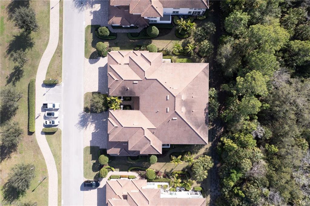 7825 Hawthorne Drive, Unit 2104 Naples, FL 34113 - Photo 33 of 43 an aerial view of house with yard