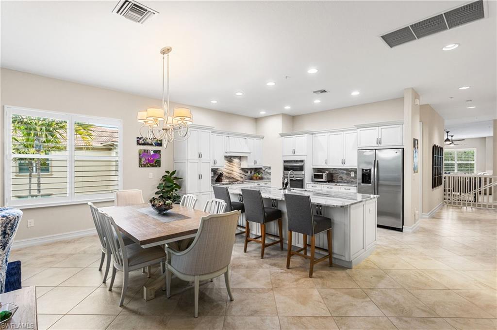 7825 Hawthorne Drive, Unit 2104 Naples, FL 34113 - Photo 7 of 43 a view of a dining room and livingroom view