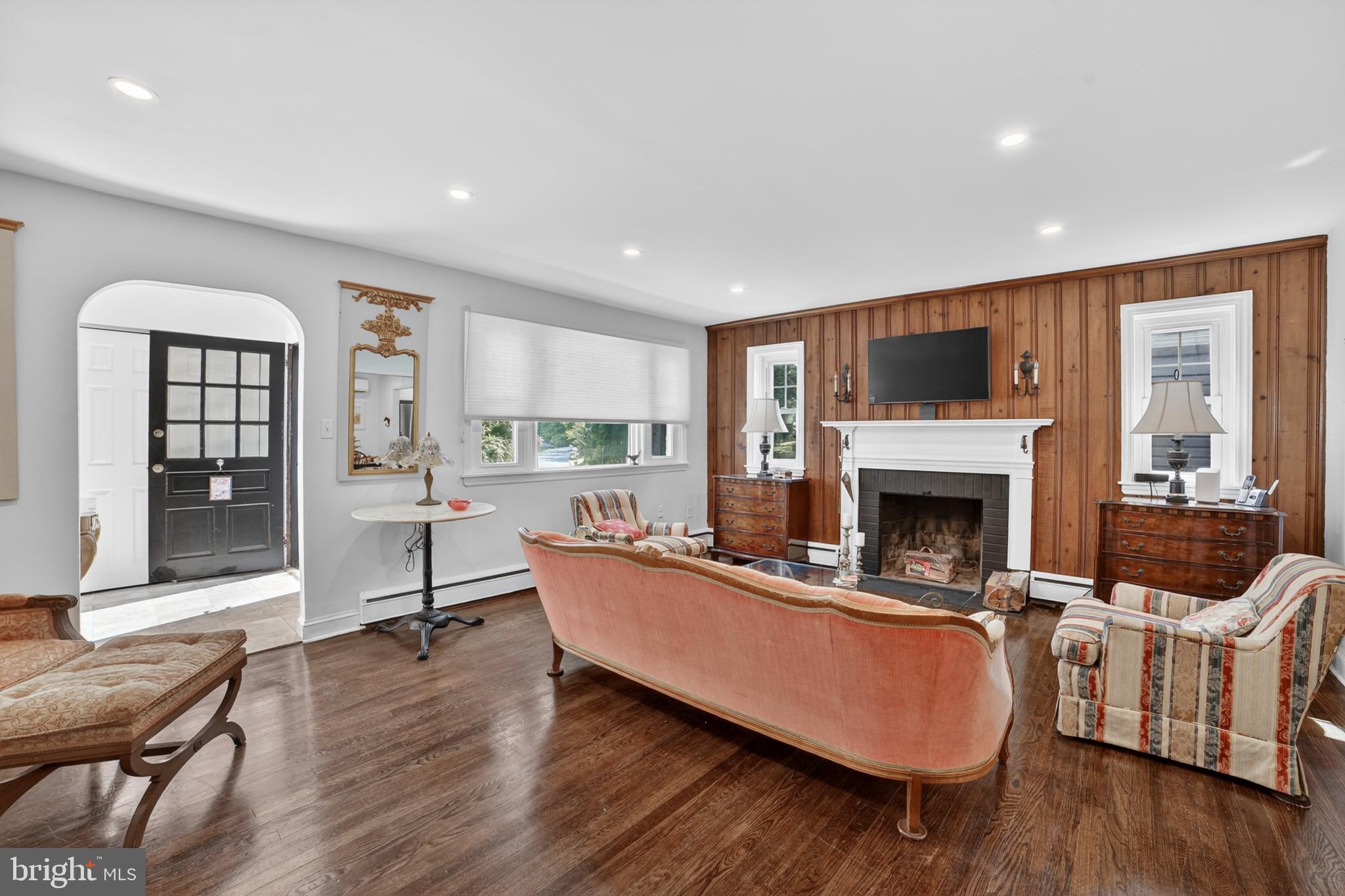 305 Irish Road Berwyn, PA 19312 - Photo 6 of 34 a living room with furniture and a fireplace