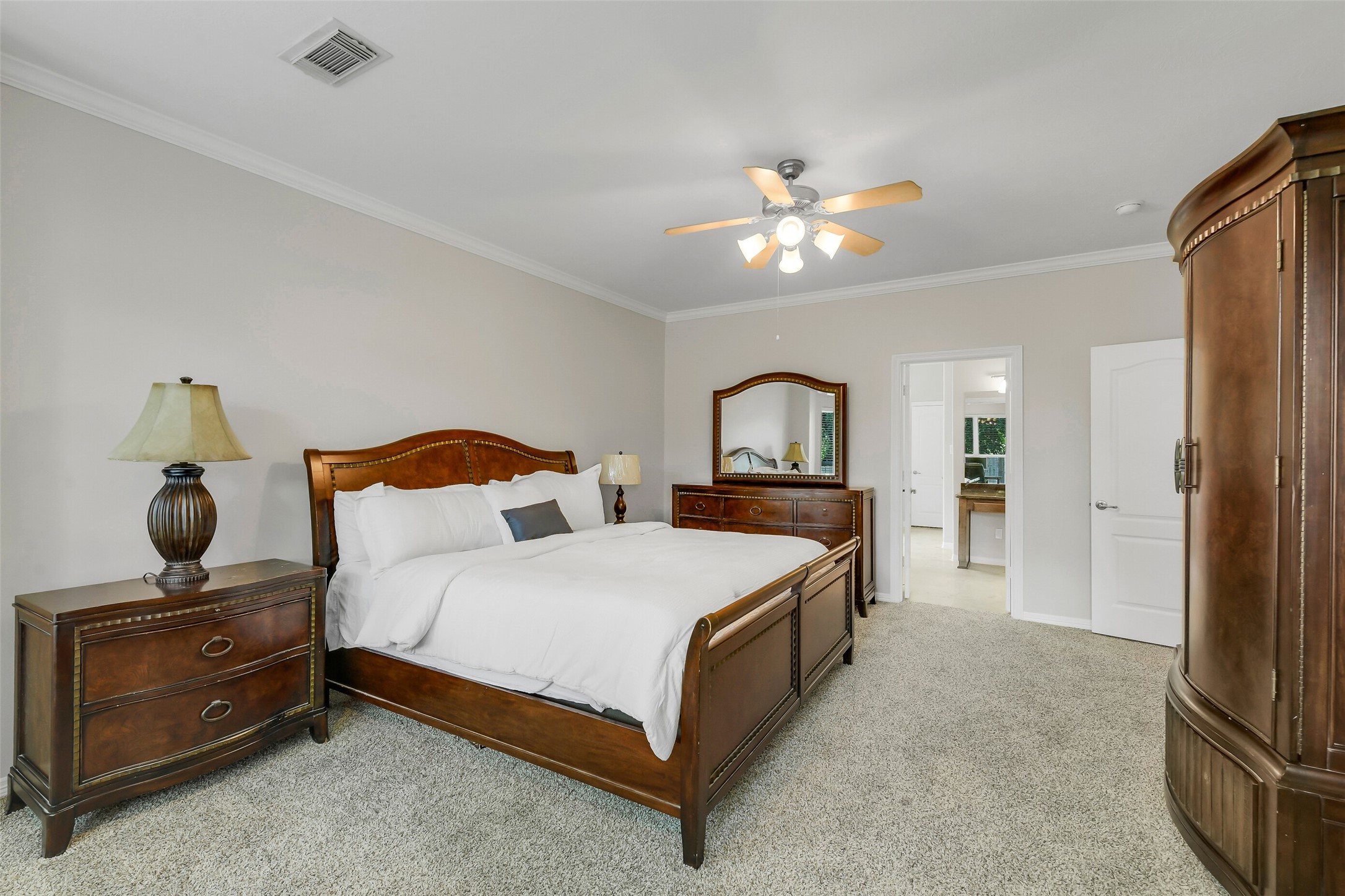 14906 Windsor Manor Houston, TX 77069 - Photo 17 of 34 Primary suite featuring crown molding ~