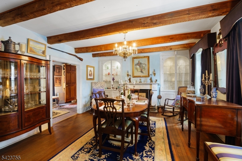 691 Ridgedale Avenue East Hanover, NJ 07936 - Photo 11 of 49 a view of a dining room with furniture window and wooden floor