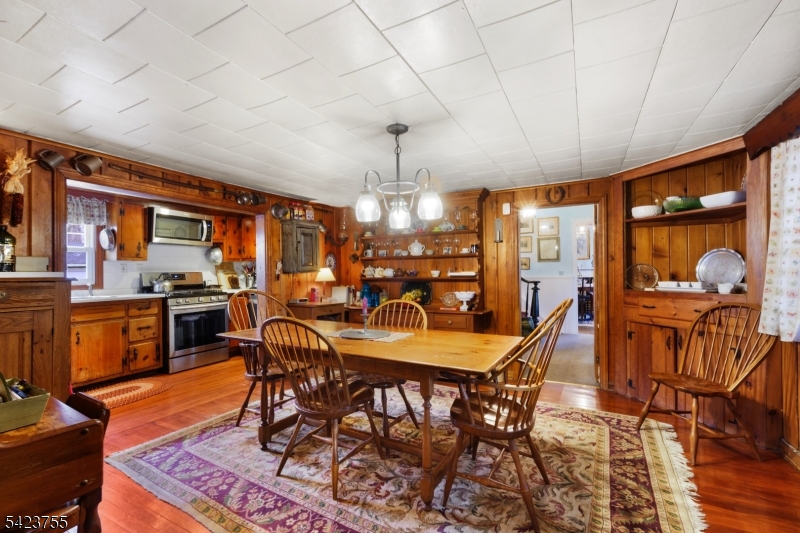 691 Ridgedale Avenue East Hanover, NJ 07936 - Photo 12 of 49 a view of a dining room with furniture window and wooden floor