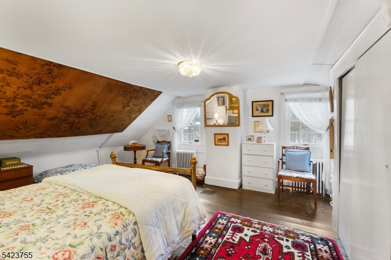 691 Ridgedale Avenue East Hanover, NJ 07936 - Photo 26 of 49 a bedroom with a bed and a view of bedroom