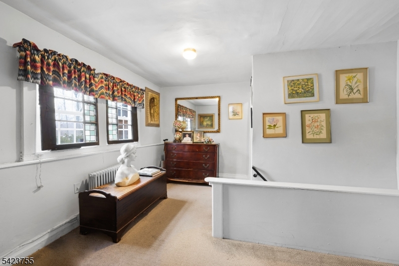 691 Ridgedale Avenue East Hanover, NJ 07936 - Photo 27 of 49 a living room with furniture and windows