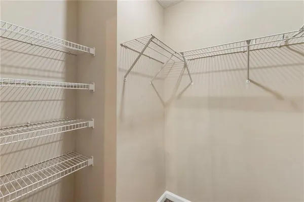 a view of a room with racks on the wall