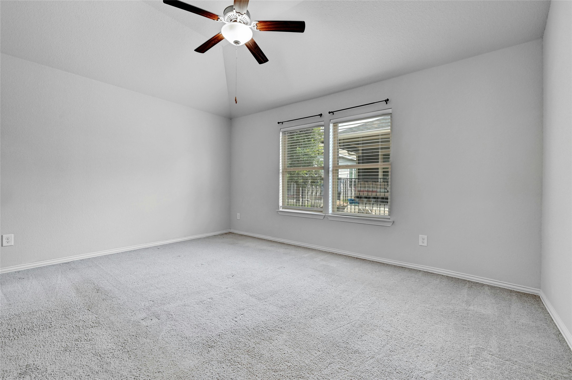 1384 Harwell Loop Kyle, TX 78640 - Photo 13 of 27 a view of an empty room with a window