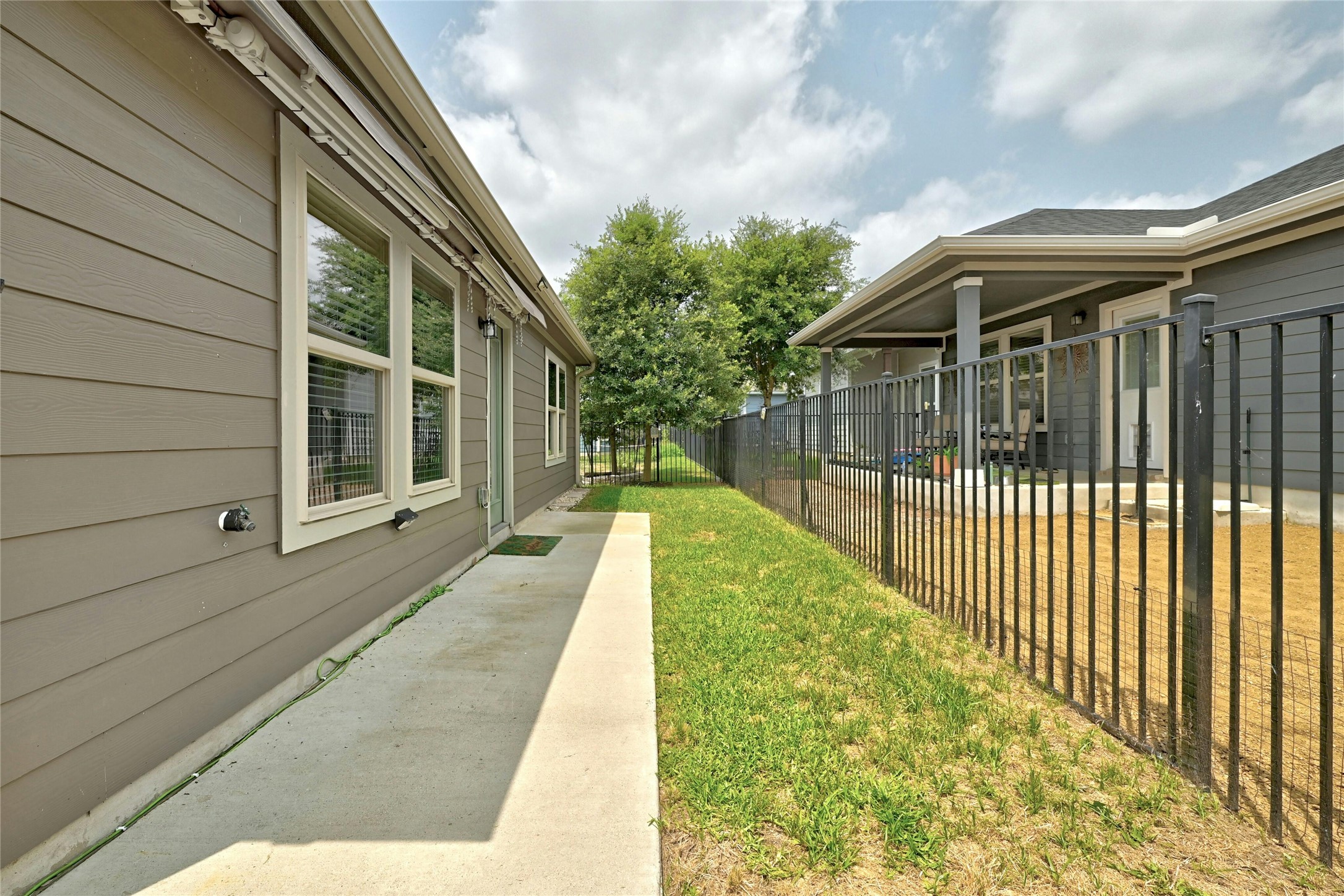 1384 Harwell Loop Kyle, TX 78640 - Photo 23 of 27 a view of balcony with a garden
