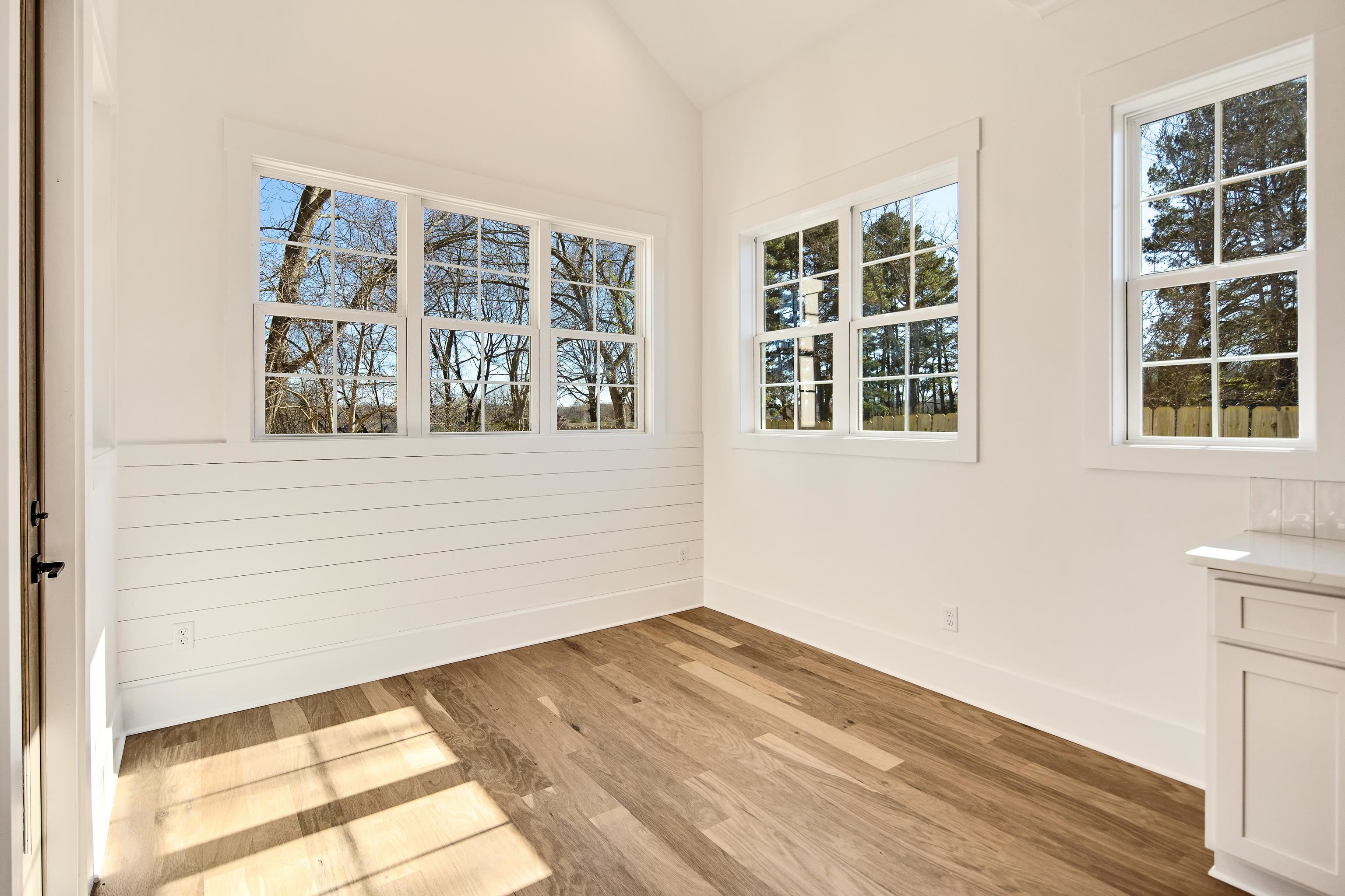 641 Fletcher Road Collierville, TN 38017 - Photo 11 of 37 a view of an empty room with wooden floor and a window