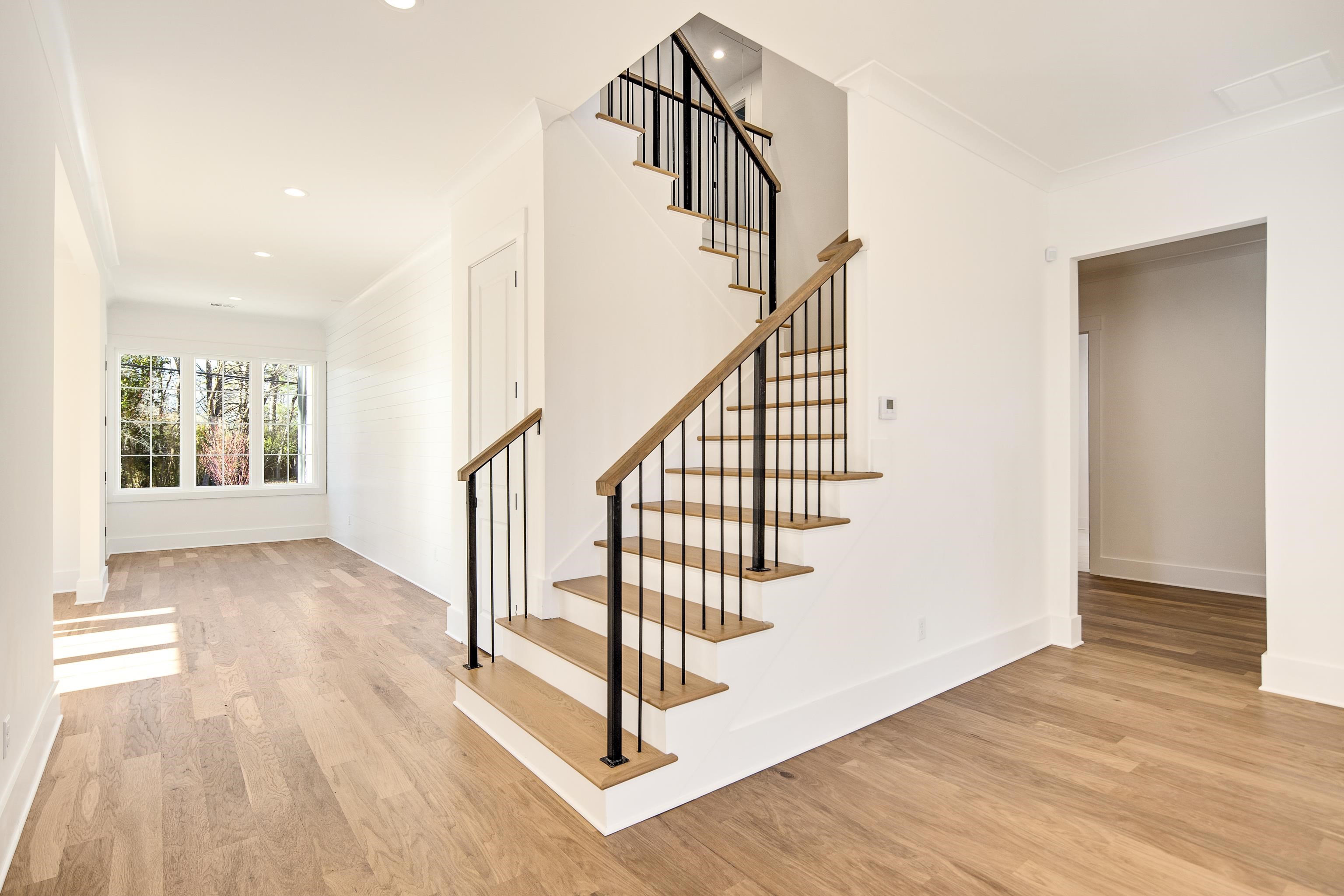 641 Fletcher Road Collierville, TN 38017 - Photo 21 of 37 a view of entryway and hall with wooden floor