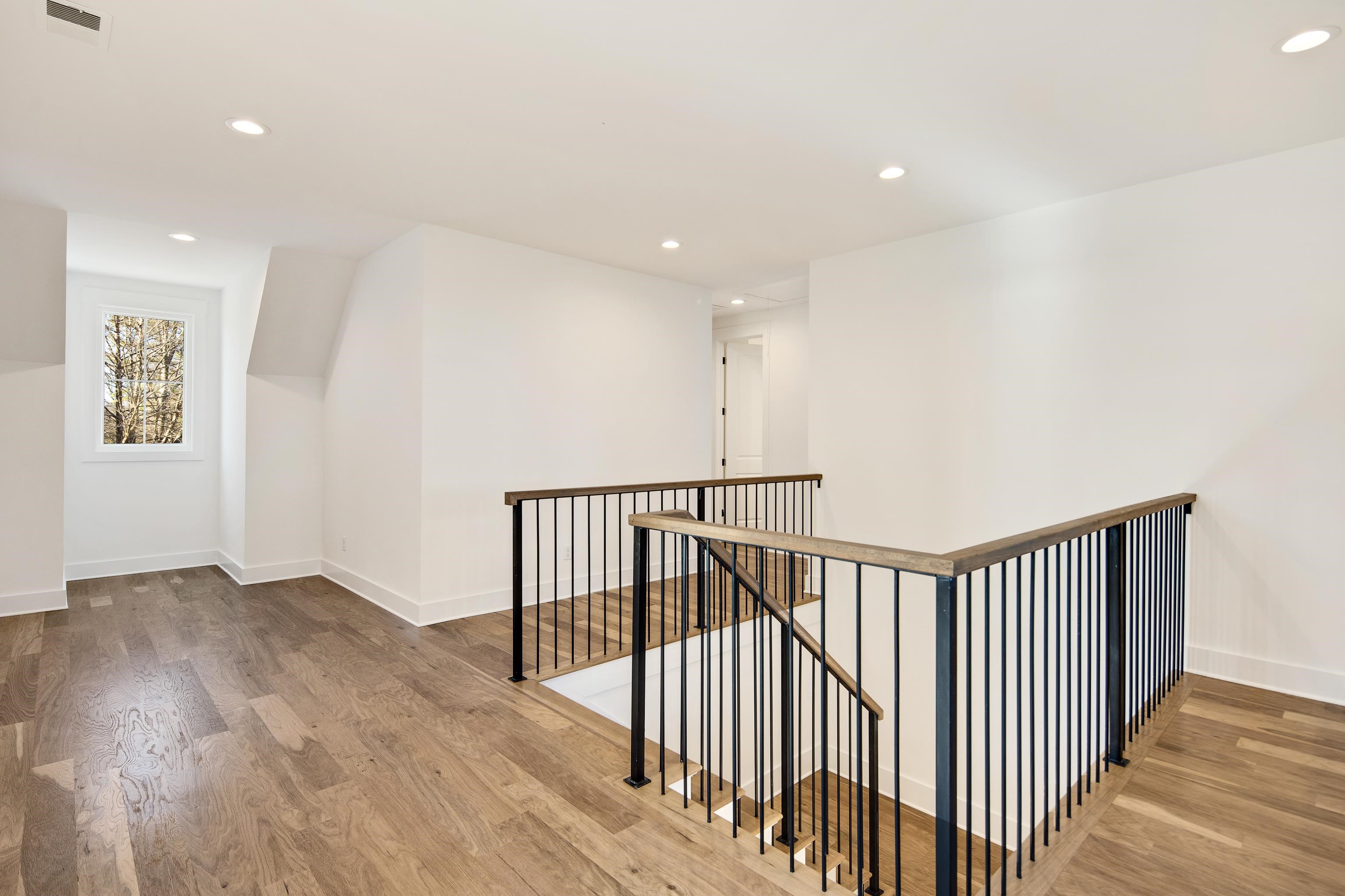 641 Fletcher Road Collierville, TN 38017 - Photo 22 of 37 a view of hallway with wooden floor