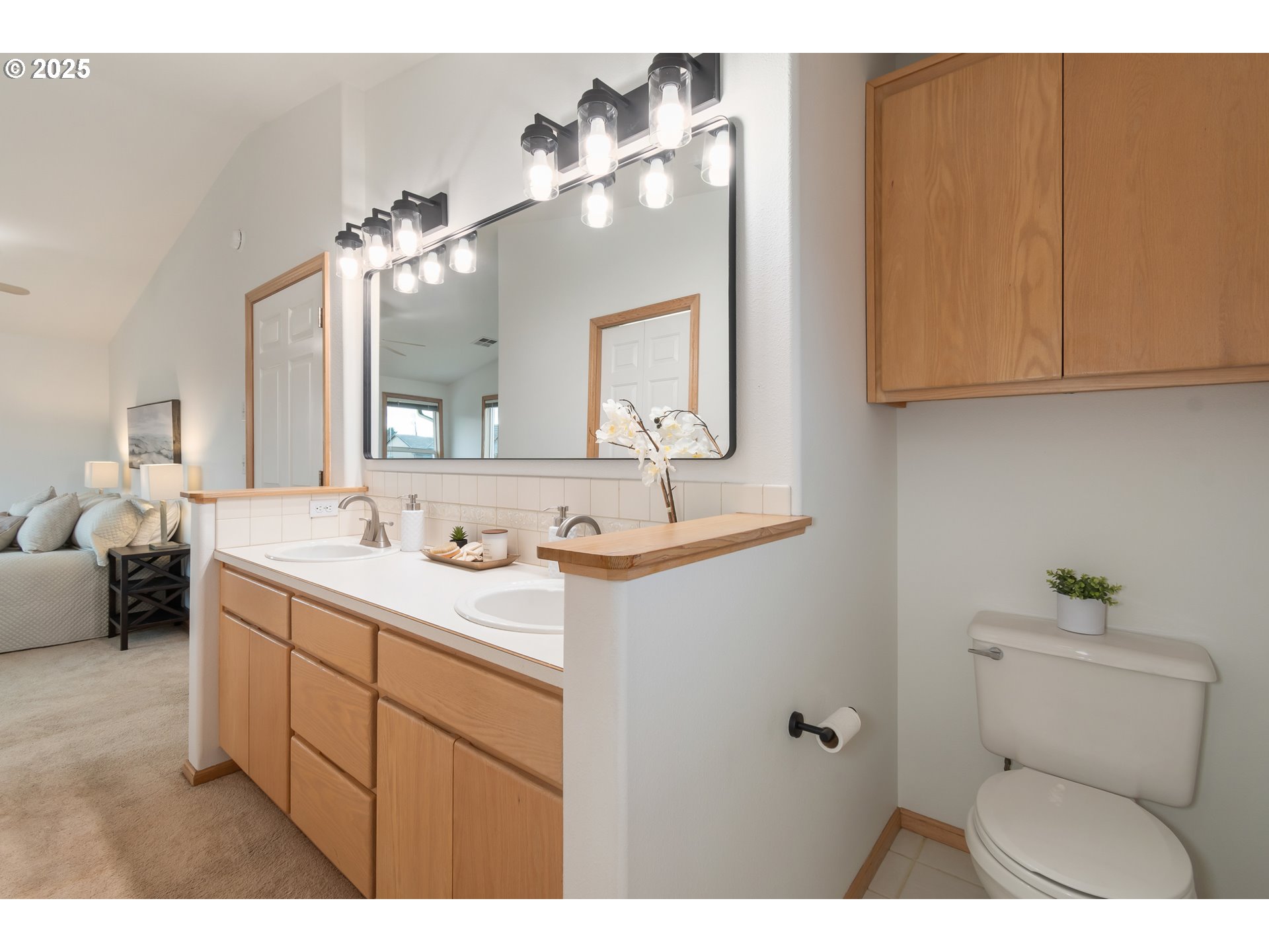 2360 Dale Avenue Eugene, OR 97408 - Photo 24 of 48 a bathroom with a toilet sink and mirror
