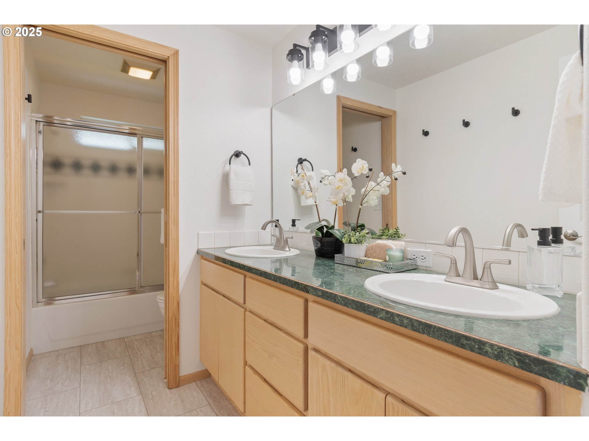 2360 Dale Avenue Eugene, OR 97408 - Photo 33 of 48 a bathroom with a granite countertop sink mirror and shower